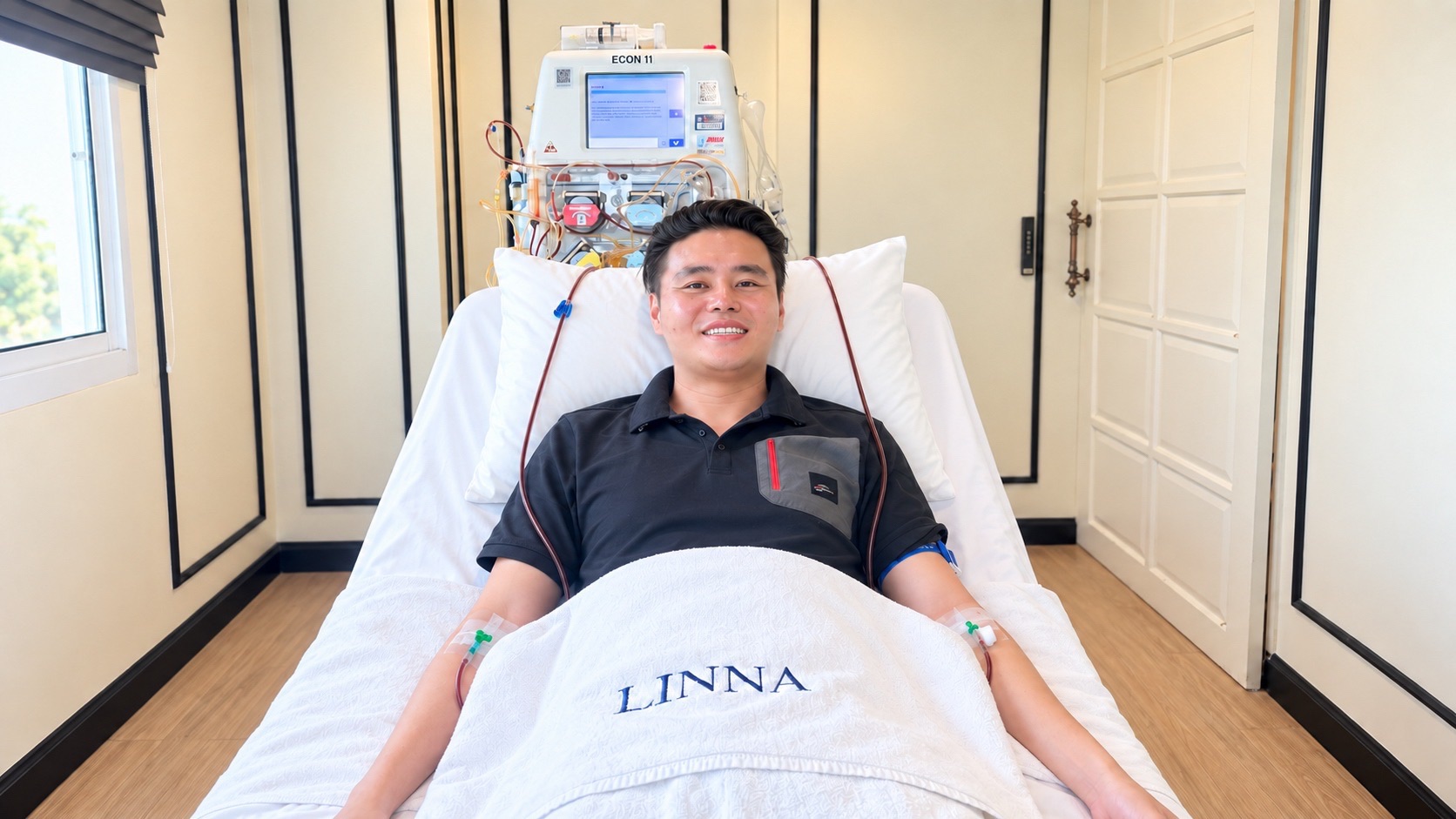 Smiling patient reclining during a DFPP session at LINNA Clinic Bangkok